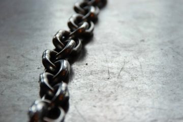 metal chain of links on concrete