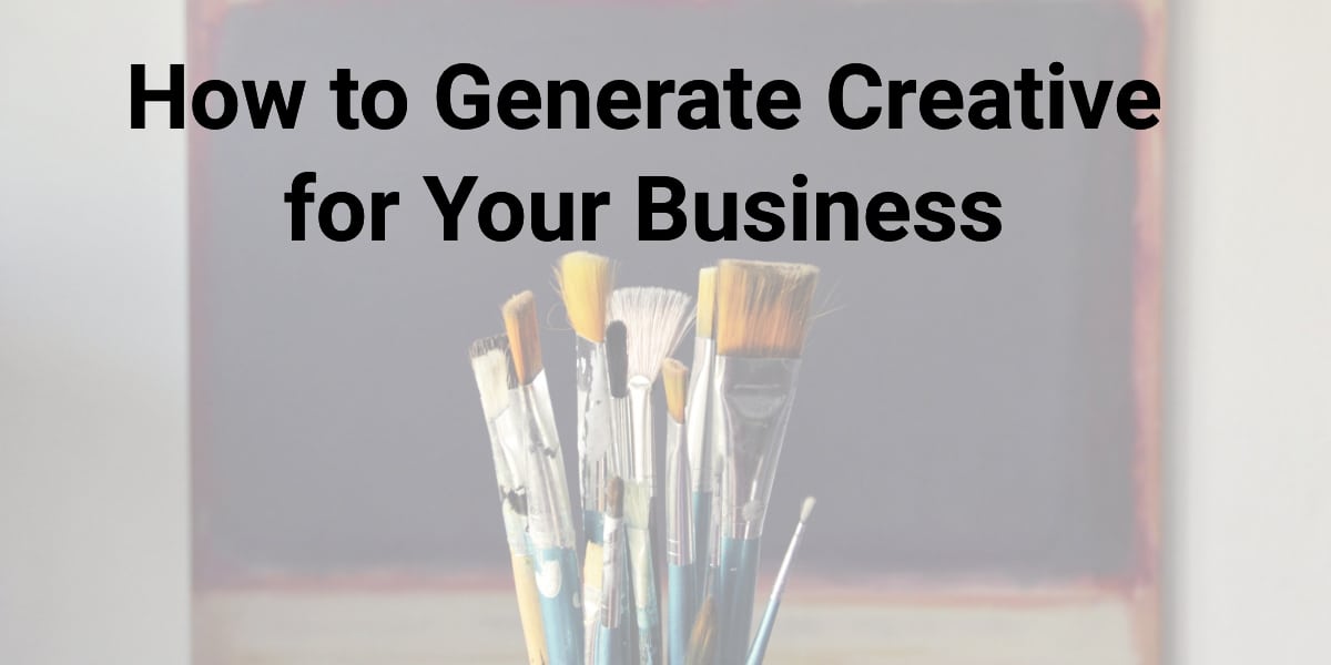 paint brushes on a table with a board in the background with the text "how to generate creative for your business"